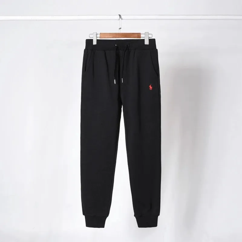 Black pants with red label
